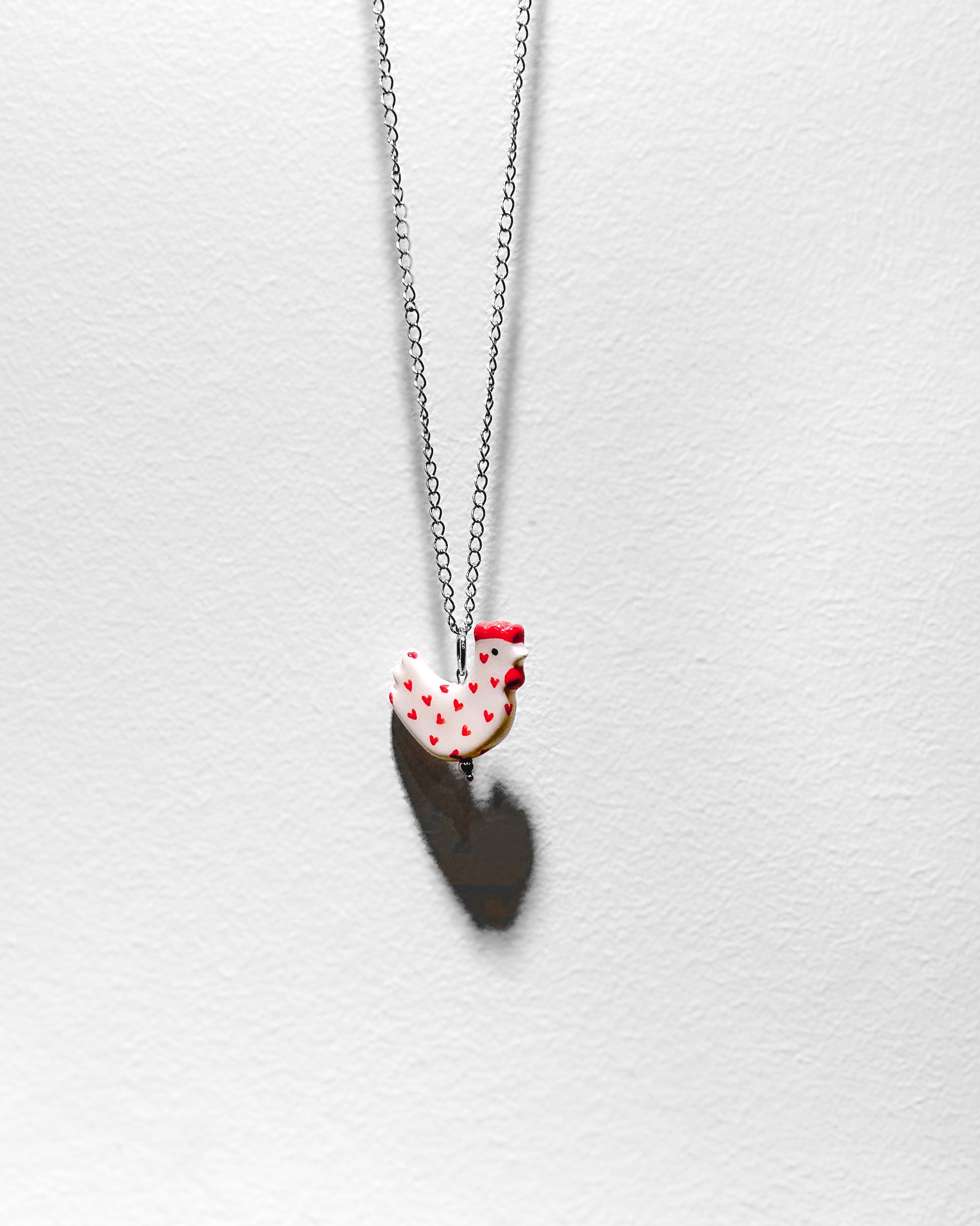 Ceramic pendant with a chain “Kura”
